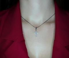 Жіночий срібний хрестик із кубічним цирконієм покритий родієм